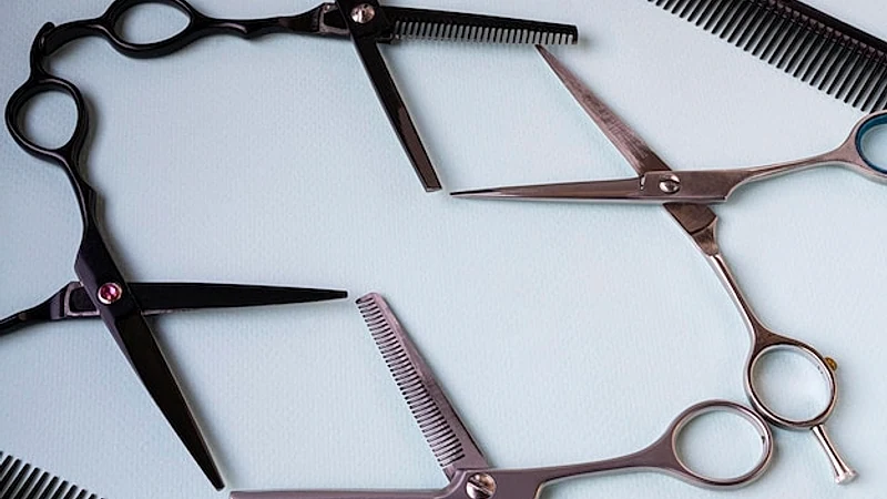Hairdressing set. Background hairdresser. Scissors. Salon. Beauty saloon. A haircut.