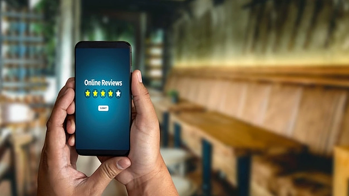 Cropped hand of person using mobile phone