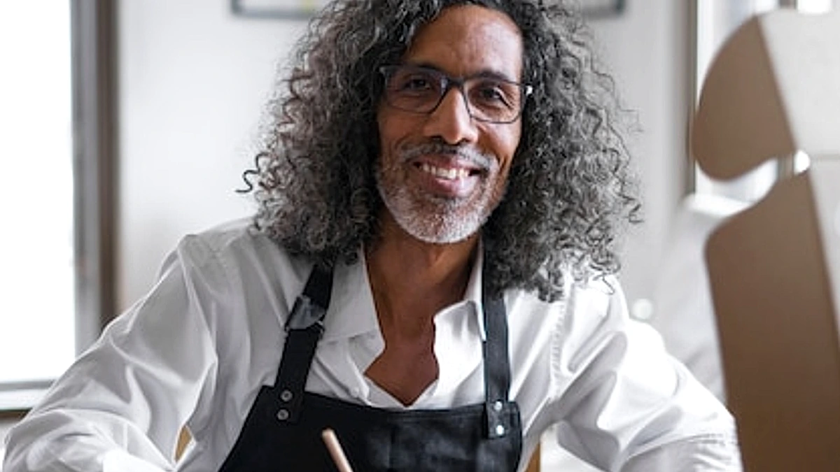 Smiley business owner with document medium shot